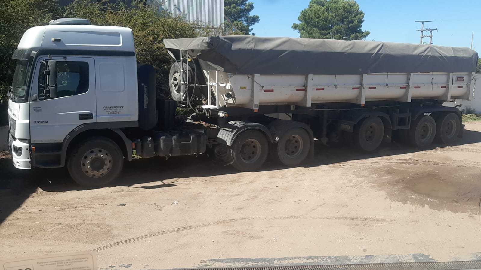 Truck with dump trailer